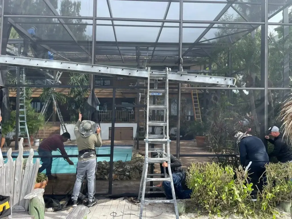 Construction crew building pool enclosure